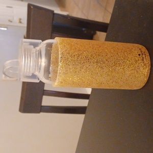 Kate Spade Gold Glitter Bottle